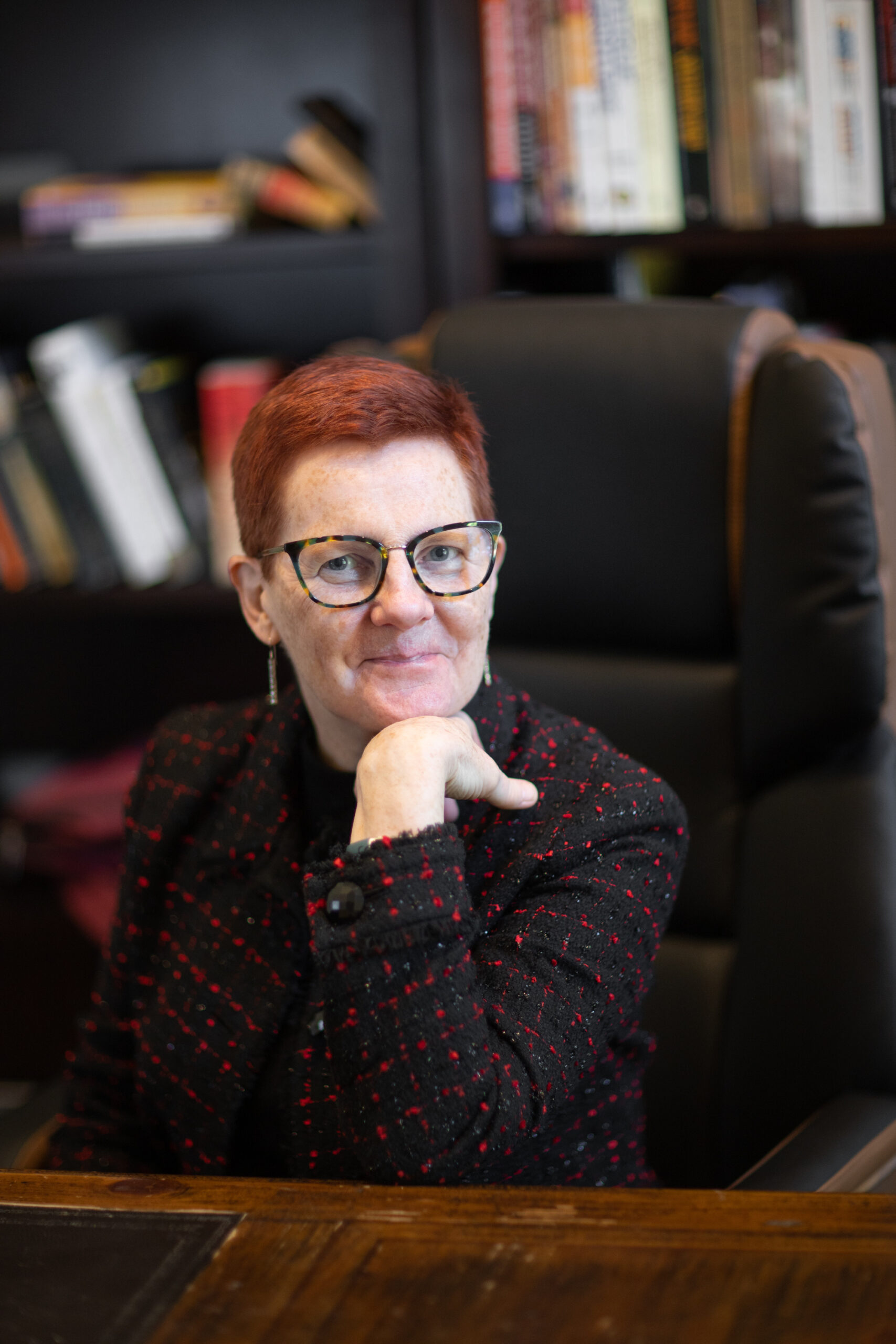 Ruth Pearce, attorney and Guardian ad Litem, seated at her desk